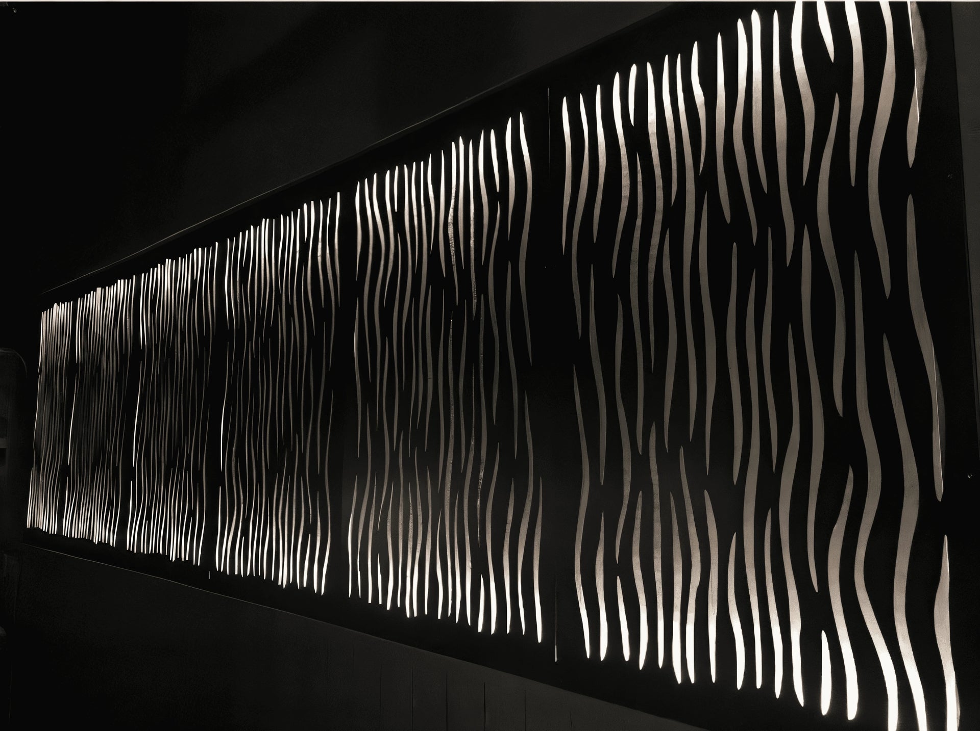 Metal Screens backlit on wall