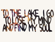Text 'To the lake I go to lose my mind and find my soul' with a gradient effect on a white background.