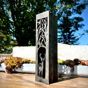 Decorative Vertical Garden Column with deer design in a garden setting