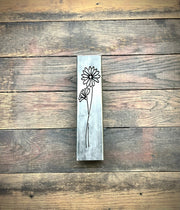 Outdoor Decorative Pillar with floral design on a wooden surface