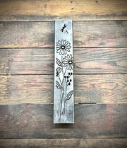 Outdoor Decorative Pillar with floral patterns on a wooden background