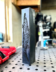 Garden column pillar with shark design on a workbench