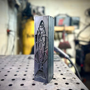 Garden column pillar with fish design on a workshop table