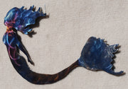 Colorful sea creature model on a beige background